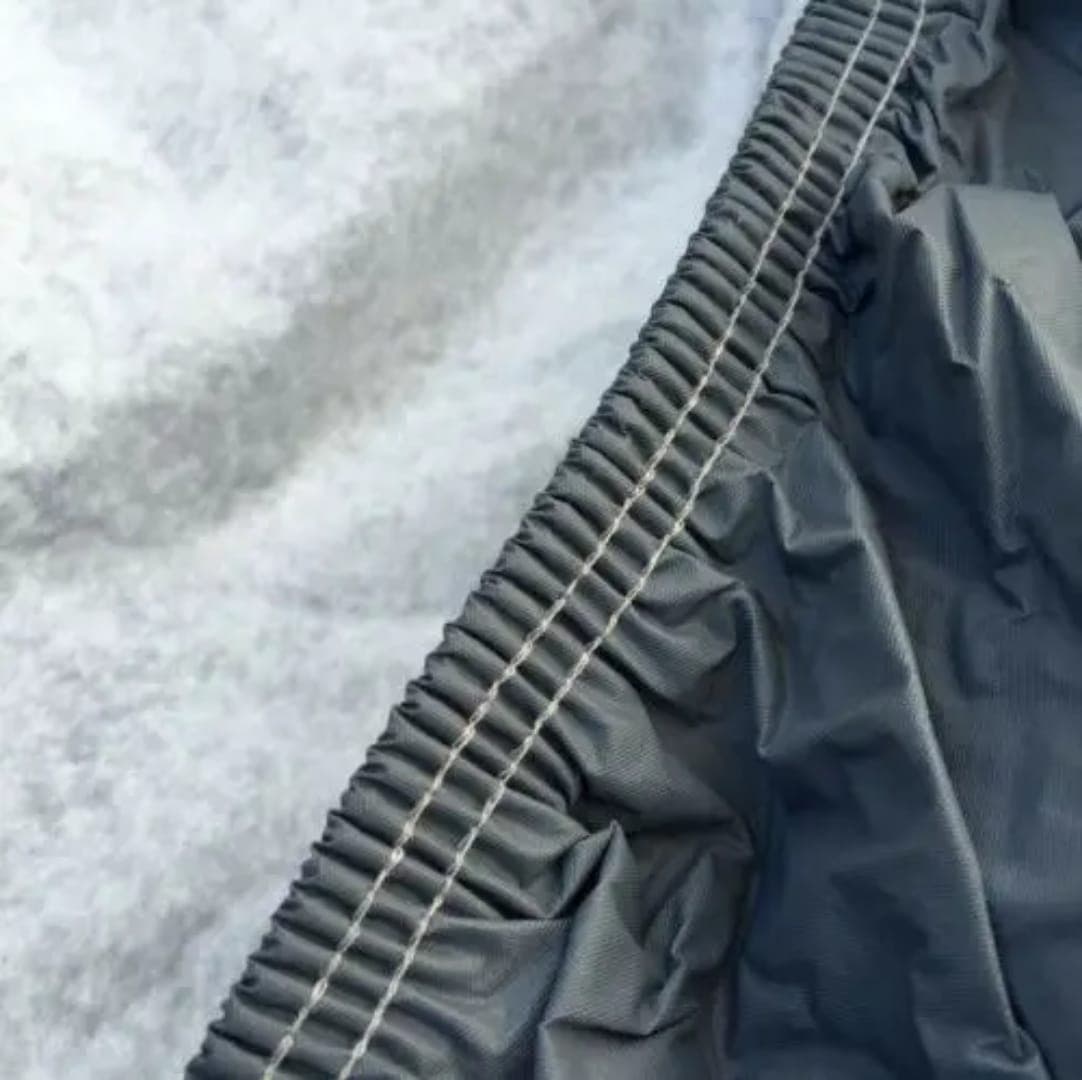 Full side view of the covered car